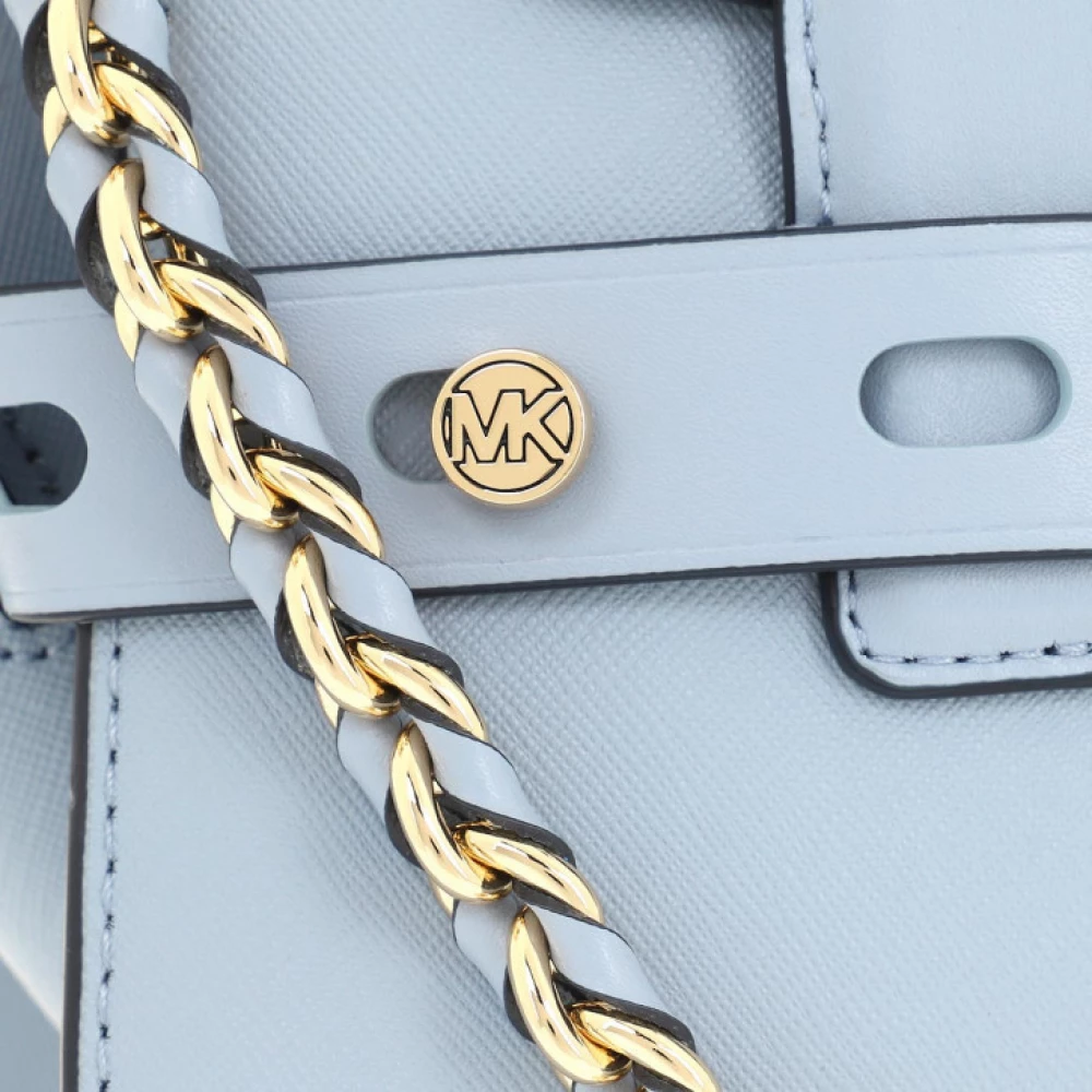Michael Kors on X: Bag about town: the extra-small Carmen